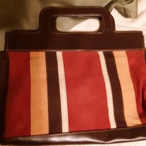 2 purses. One Tig & co. And other Victoria secret